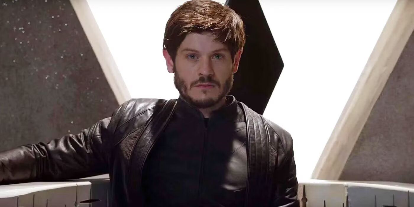 Iwan Rheon sitting on a throne as Maximus in Inhumans.