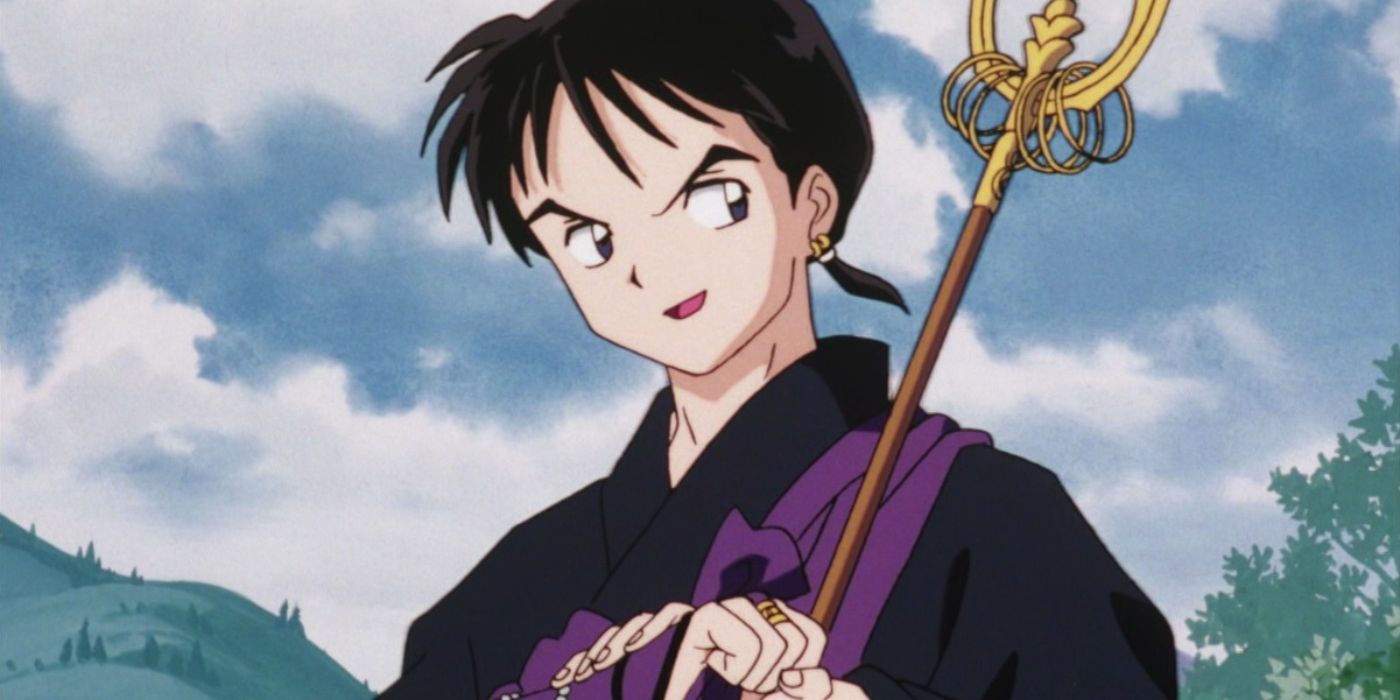 Miroku grins as he grabs Bead's wrist at Inuyasha's wind tunnel.