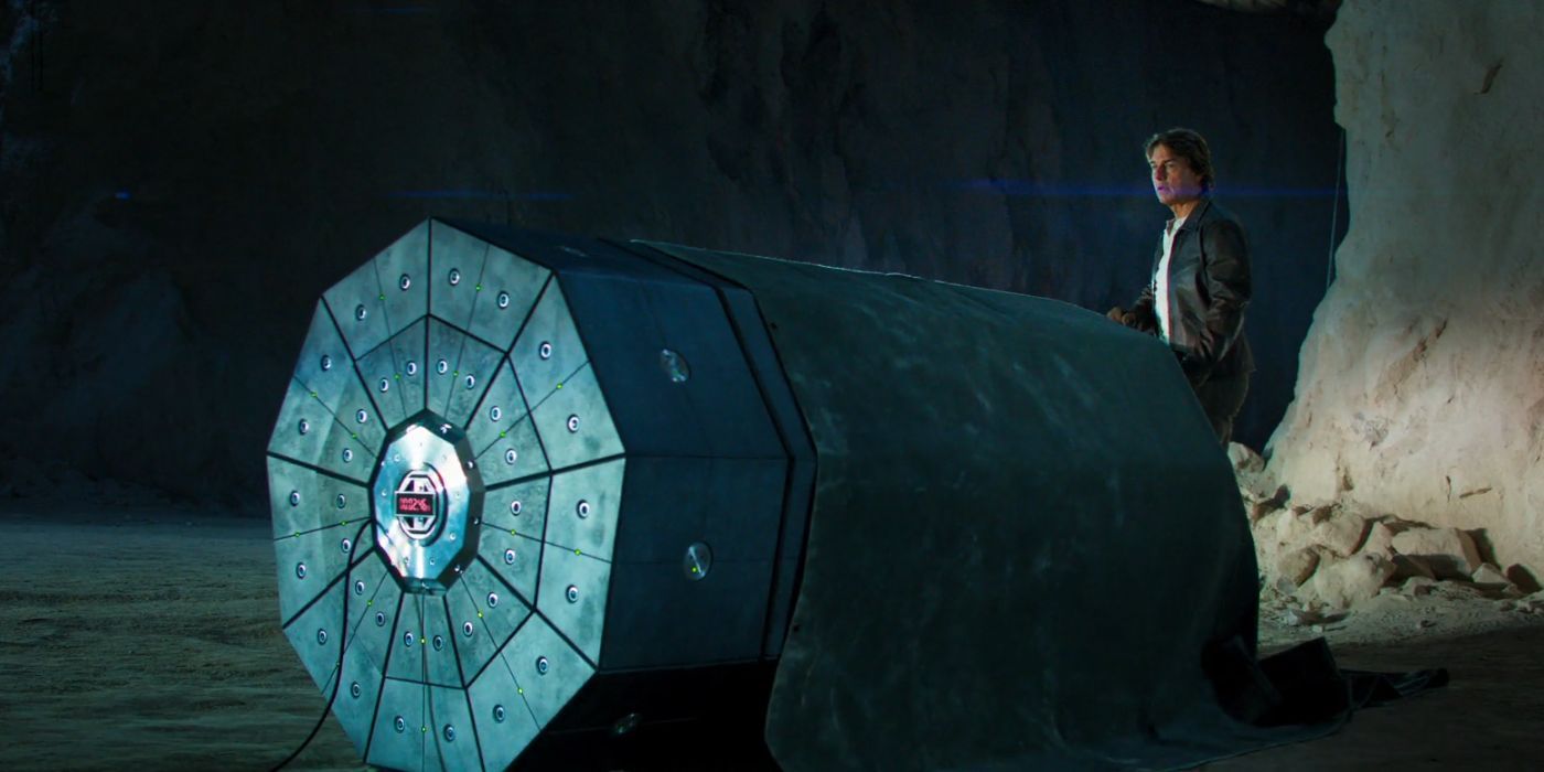 Tom Cruise as Ethan Hunt uncovering a bomb in Mission: Impossible - The Final Reckoning.