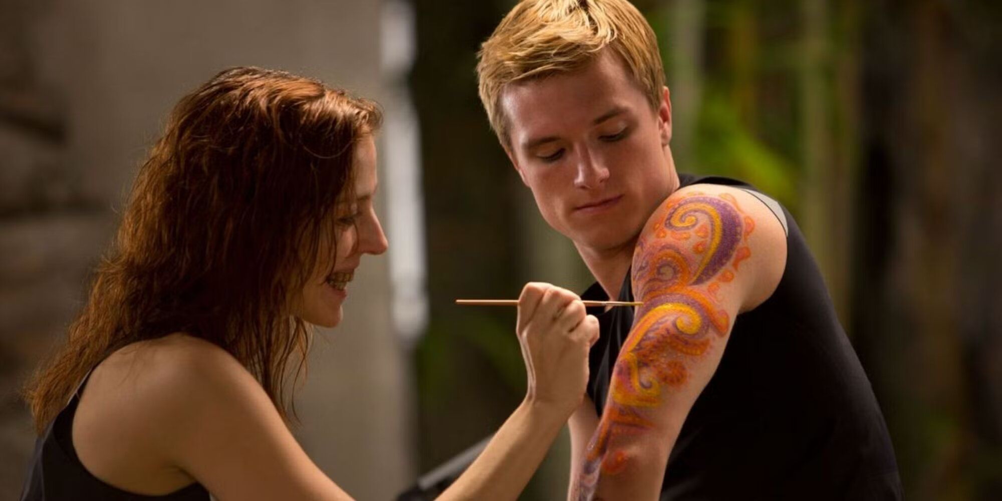 The female morphling painting on Peeta&rsquo;s arm during Hunger Games: Catching Fire