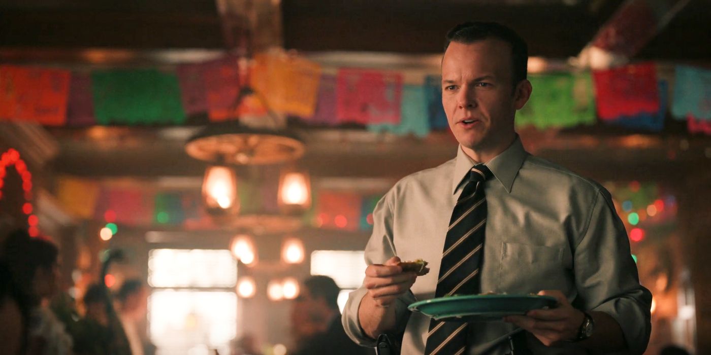 Tobias Fornell (Lucas Dixon) holding a taco and a plate in NCIS: Origins Episode 6