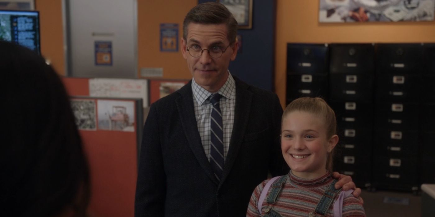 Jimmy Palmer (Brian Dietzen) with his daughter, Victoria Elizabeth Palmer (Elle Graper), in the MCRT bullpen in NCIS