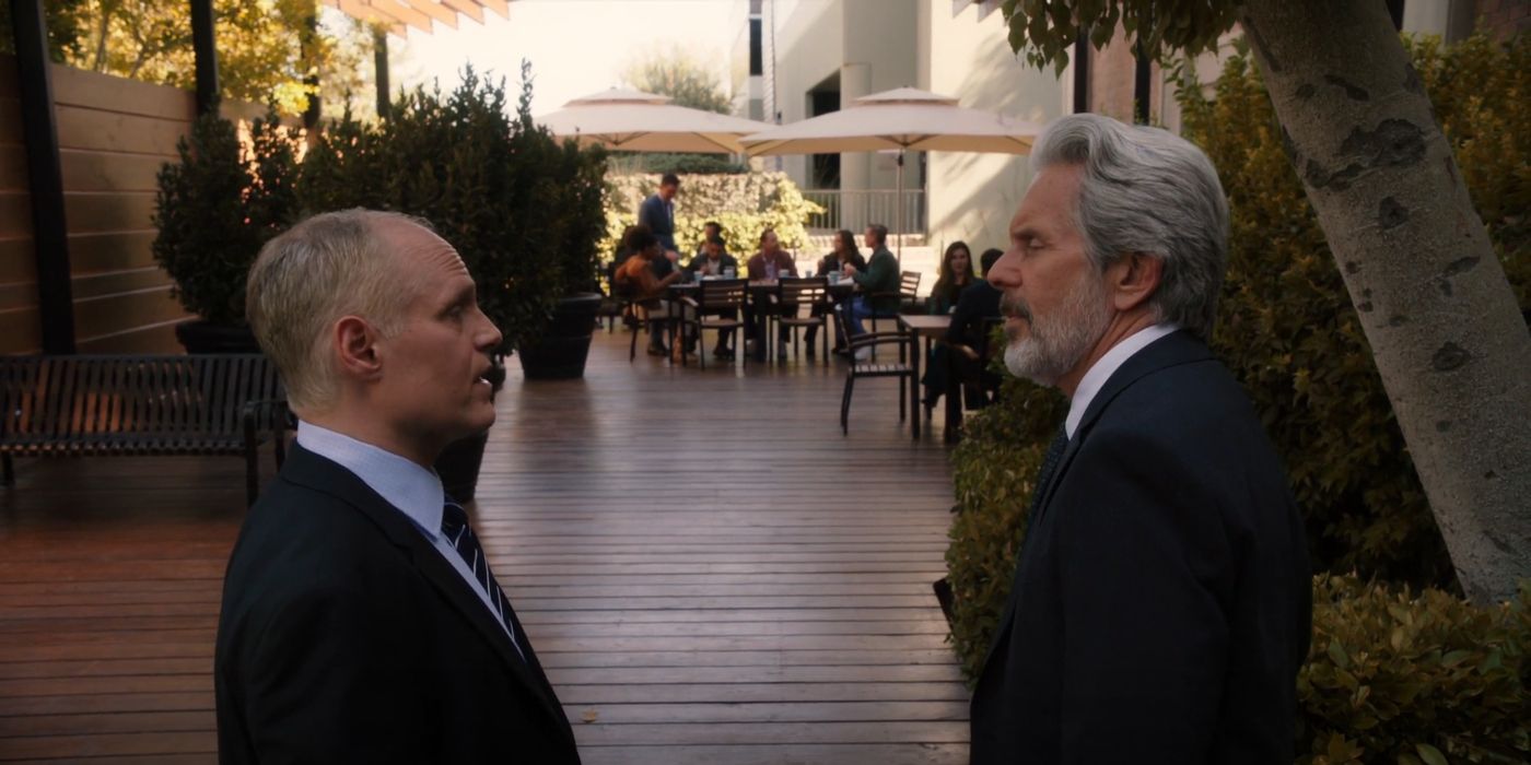 Wayne Sweeney (Erik Passoja) and Alden Parker (Gary Cole) talking while the NCIS team have a meal together in NCIS