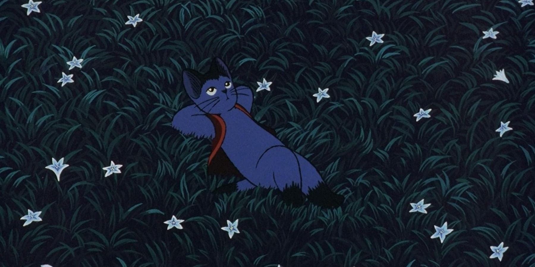 A blue cat named Giovanni lying down in a field of grass and white flowers in 'Night on the Galactic Railroad'