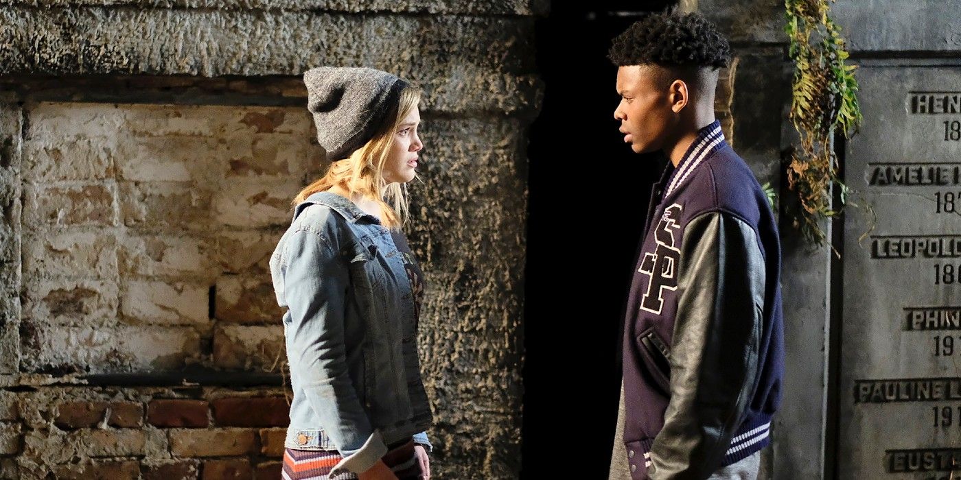 Olivia Holt and Aubrey Joseph staring at each other in Cloak and Dagger