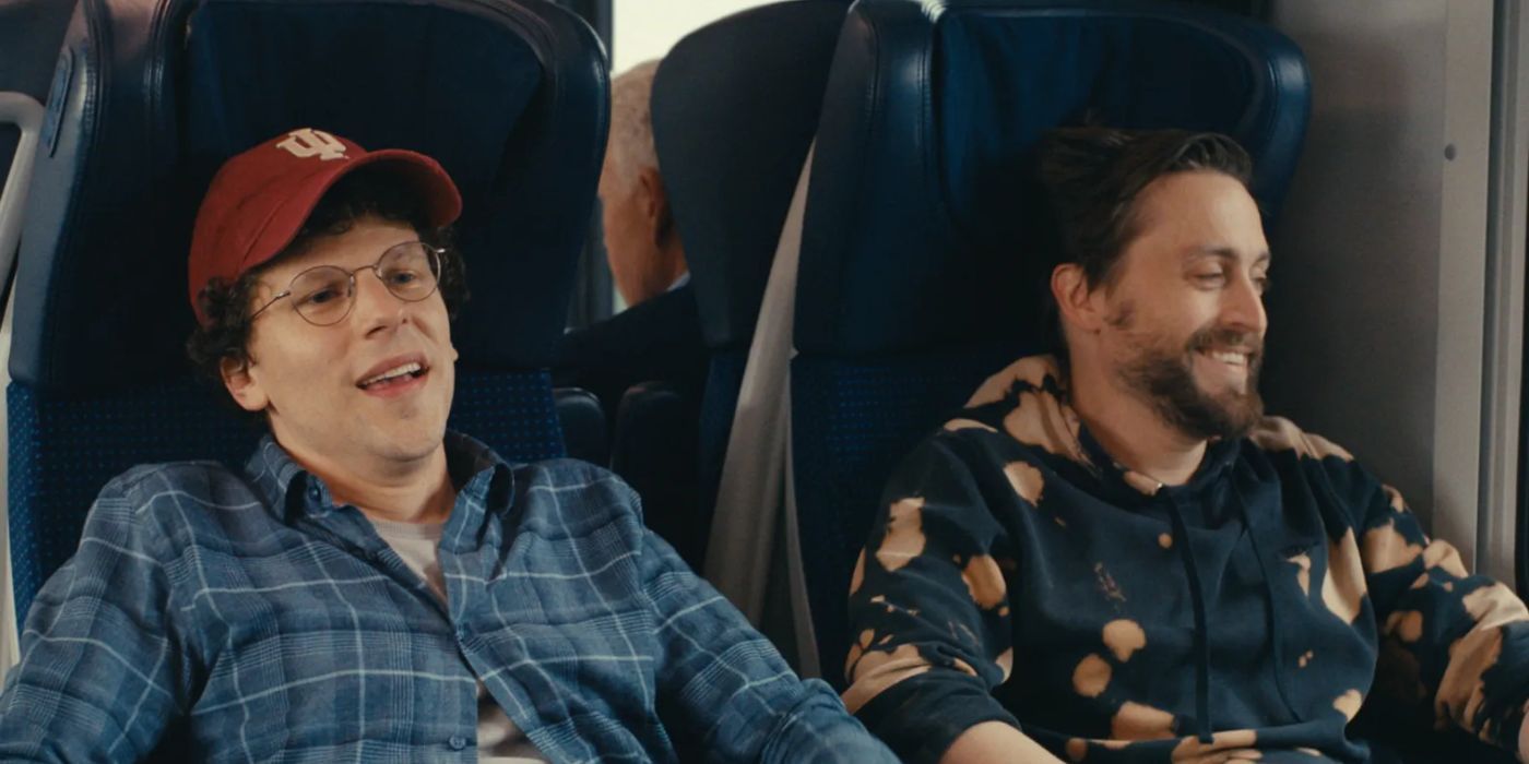 Jesse Eisenberg as David and Kieran Culkin as Benji gleefully stealing a train ride in A Real Pain