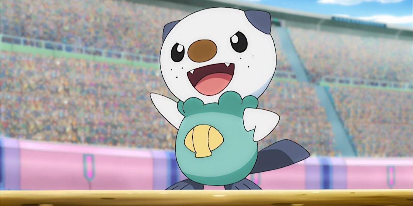 Ash's Oshawott smiling with an arm pointed up