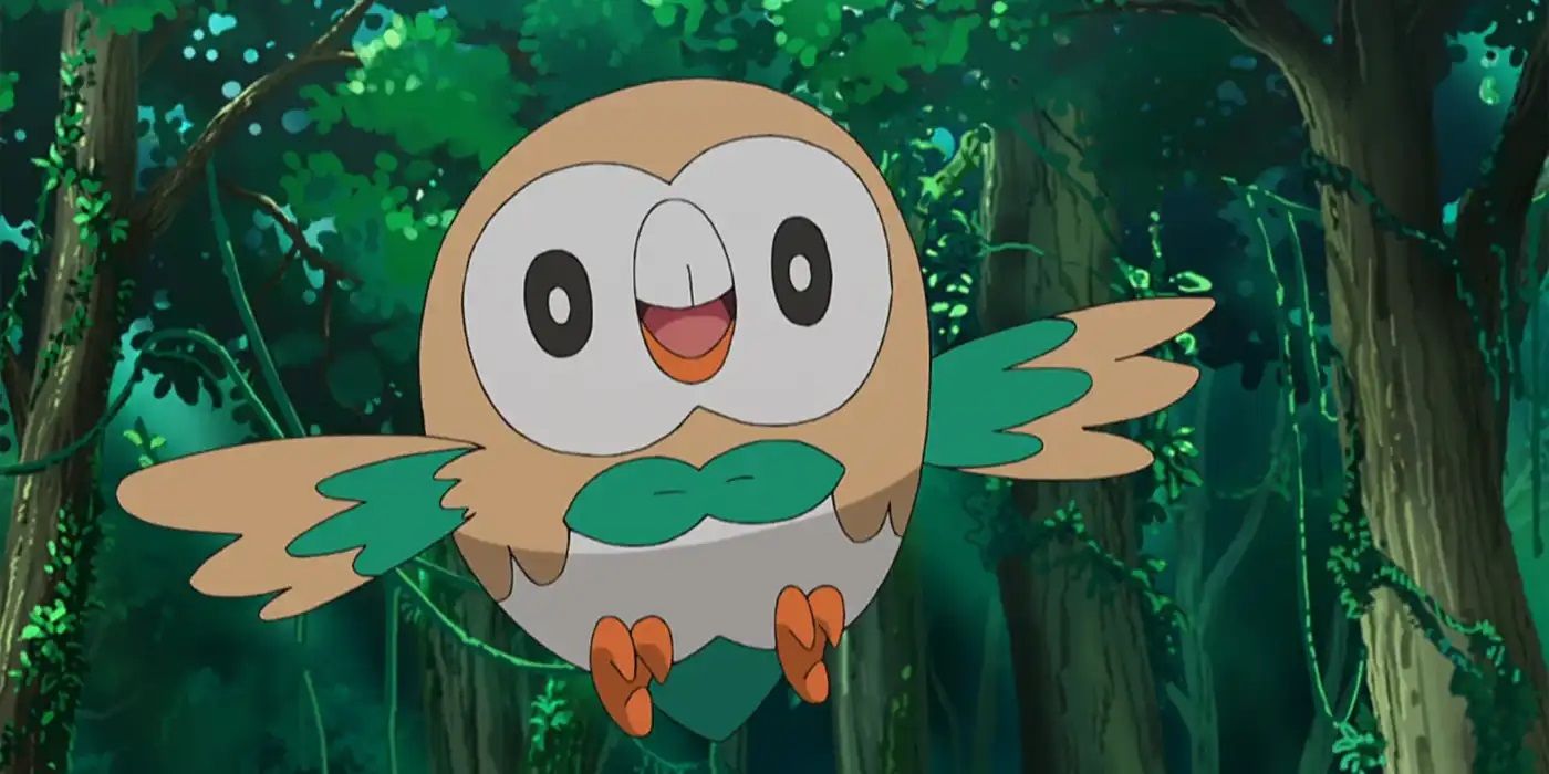 Ash's Rowlet flying in a forest