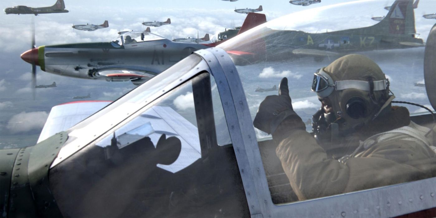 A pilot in a plane doing a thumbs up in Red Tails