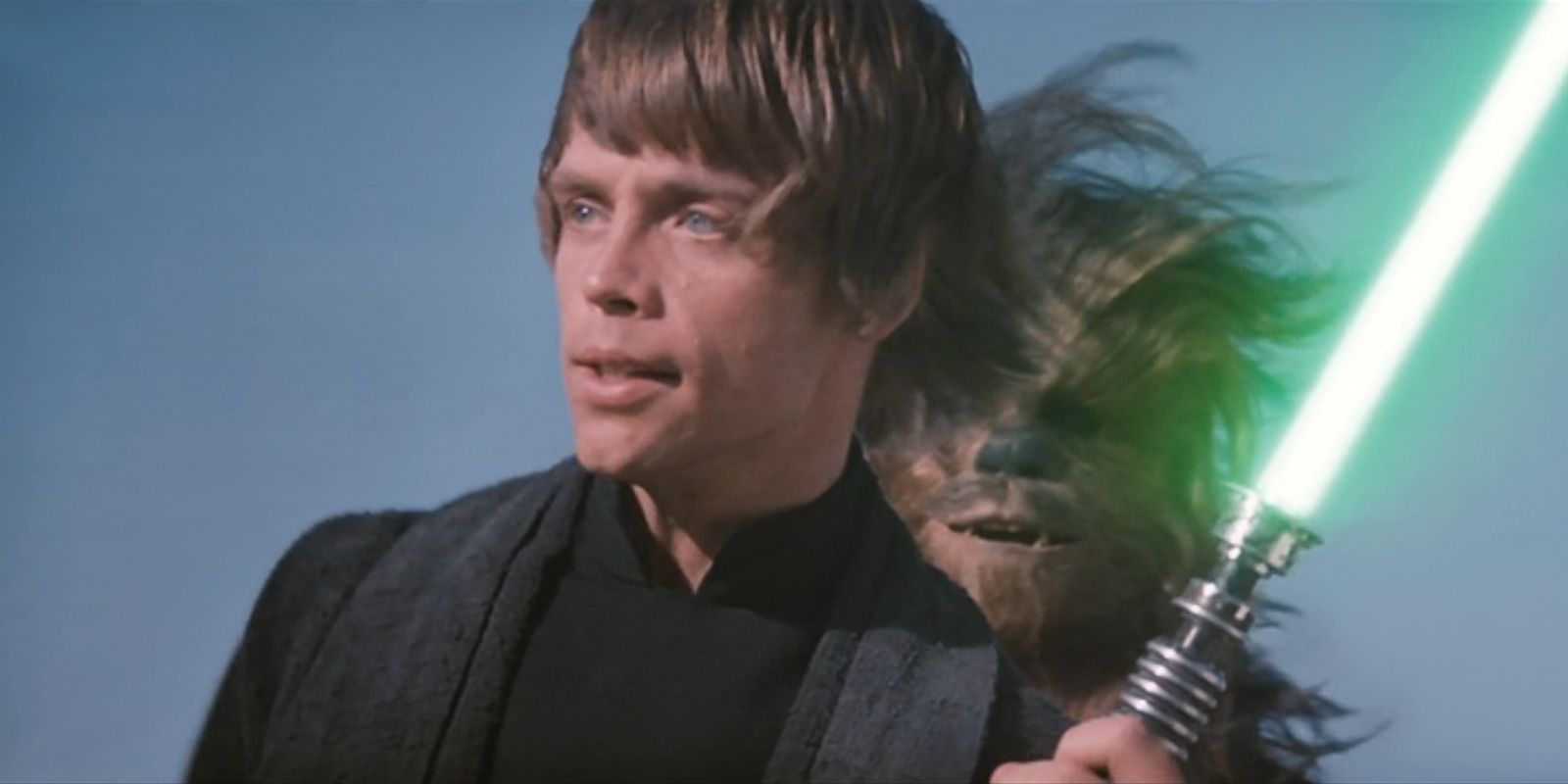 Luke Skywalker (Mark Hamill) holds his new green lightsaber in Star Wars: Episode VI – Return of the Jedi.