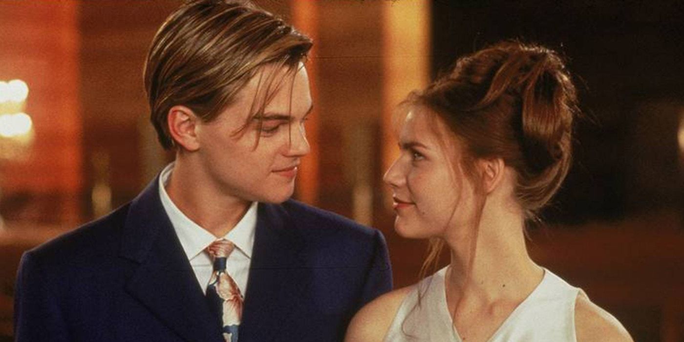 Leonardo Dicaprio's Romeo smiling at Claire Danes' Juliet in Romeo + Juliet