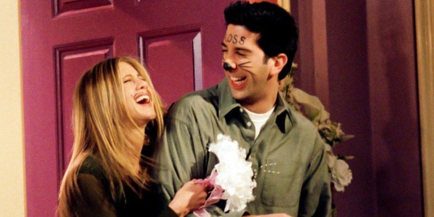 Ross and Rachel laughing as they exit a chapel in Vegas in Friends. 