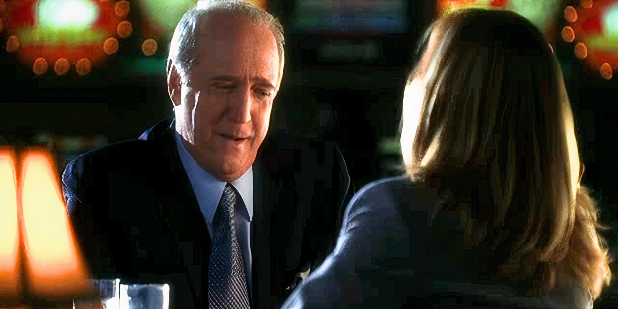 Scott Wilson, who plays Sam Brown, is sitting at a table with someone from CSI.