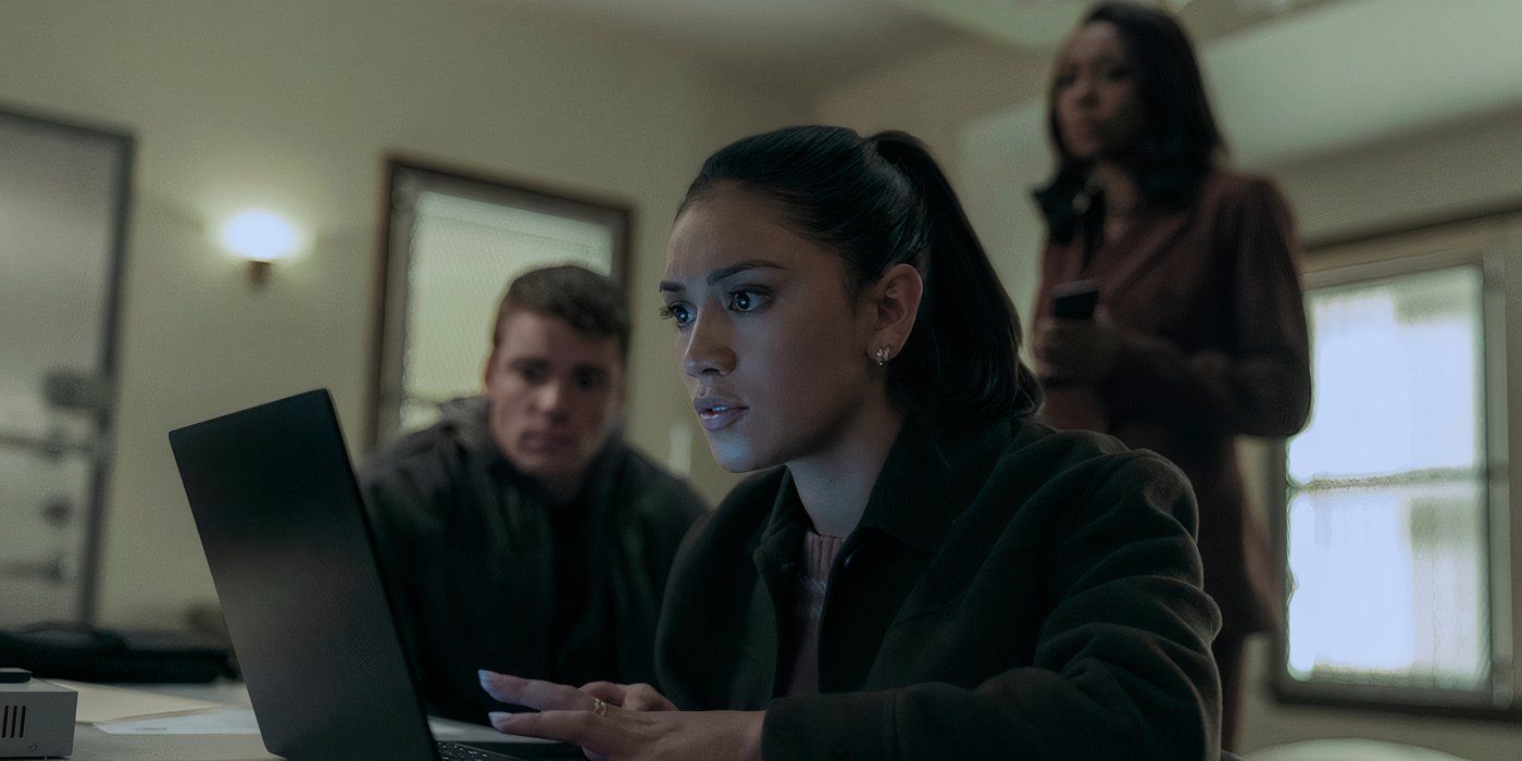 Luciane Buchanan as Rose Larkin on a computer with Gabriel Basso as Peter and Amanda Warren as Catherine looking on in 'The Night Agent'