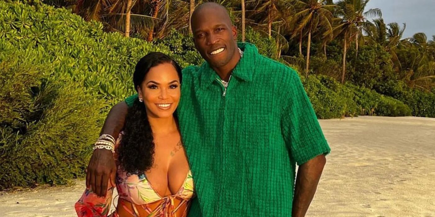 Sharelle Rosado and Chad Ochocinco Johnson posing on a beach, smiling