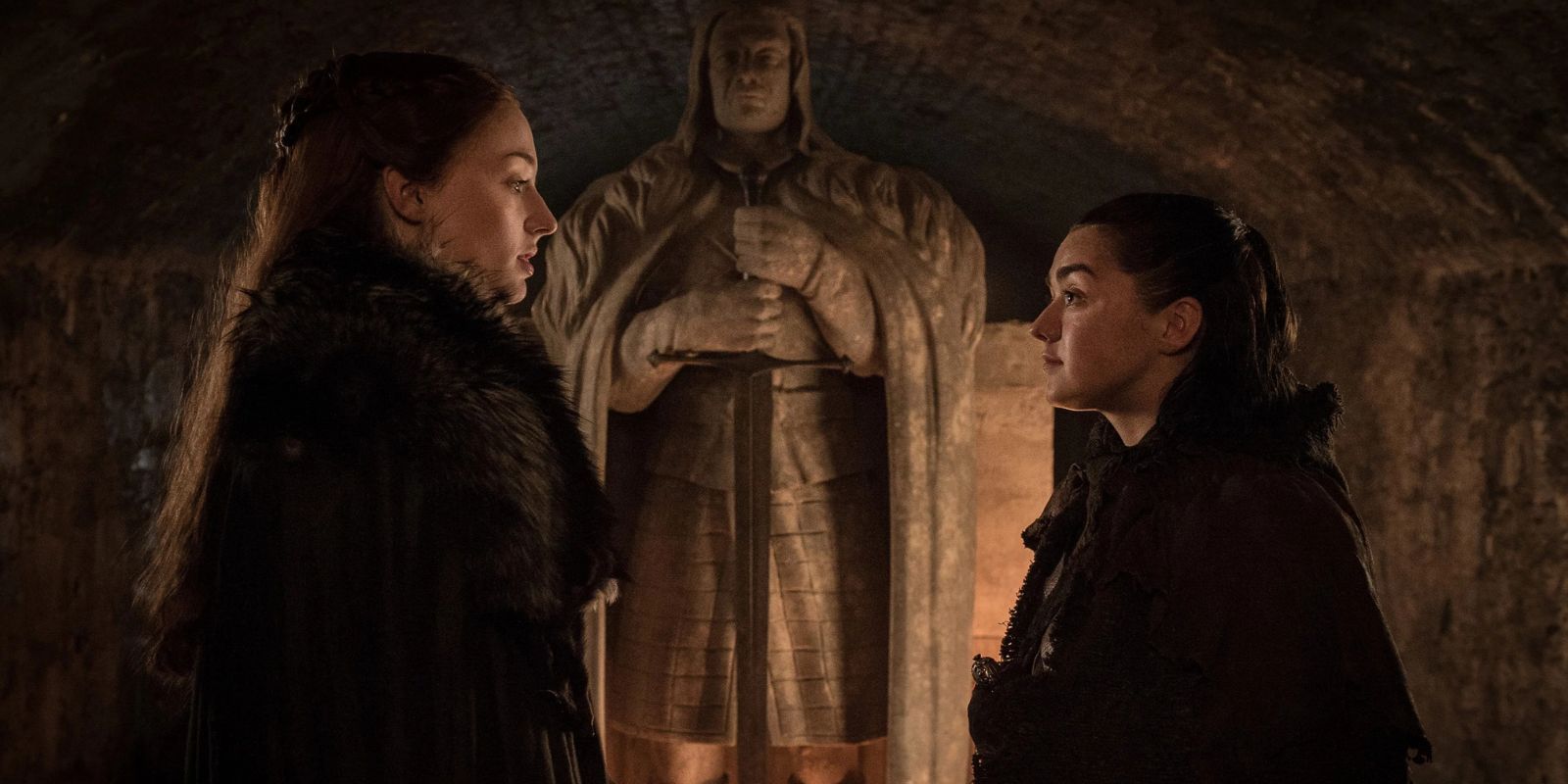 Sansa and Arya talking in the Winterfell crypts in Game of Thrones