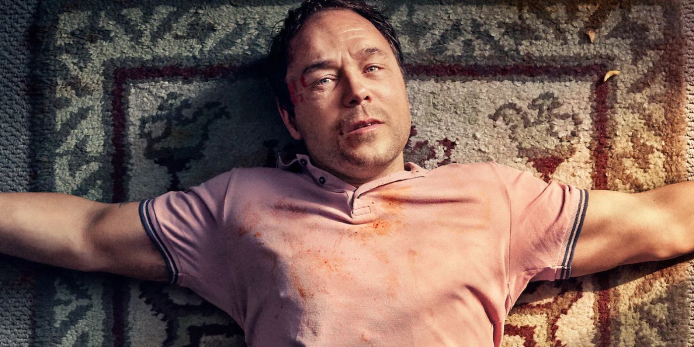 Stephen Graham laying on a rug with his arms out in The Virtues promo