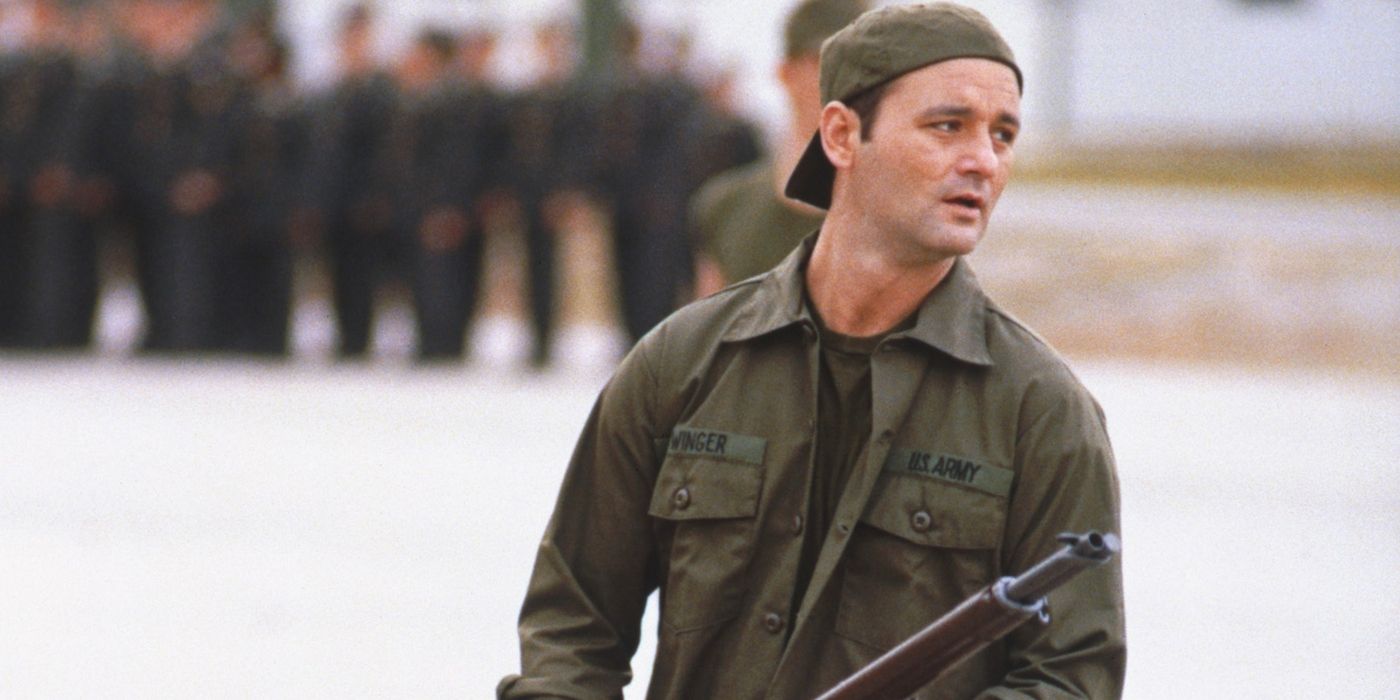 John Winger (Bill Murray) holding a rifle in 'Stripes' 