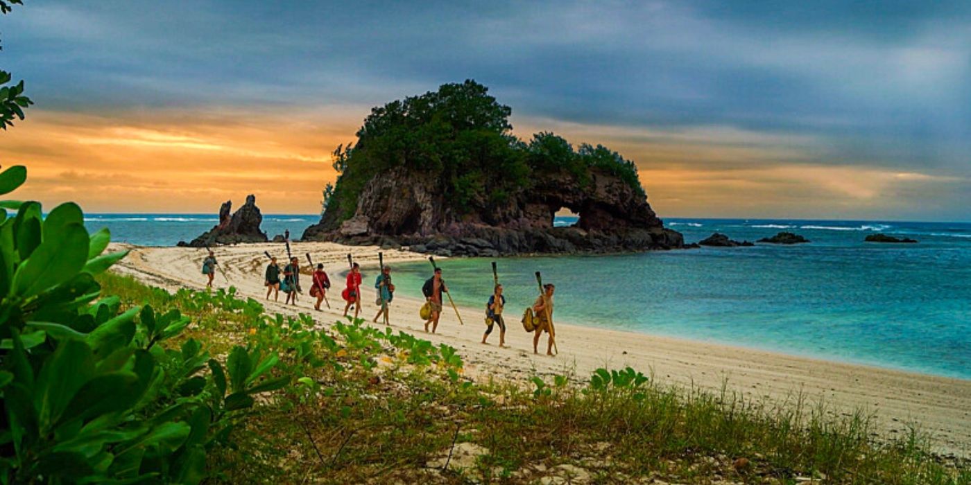 The castaways walk down the beach on &lsquo;Survivor 47.'