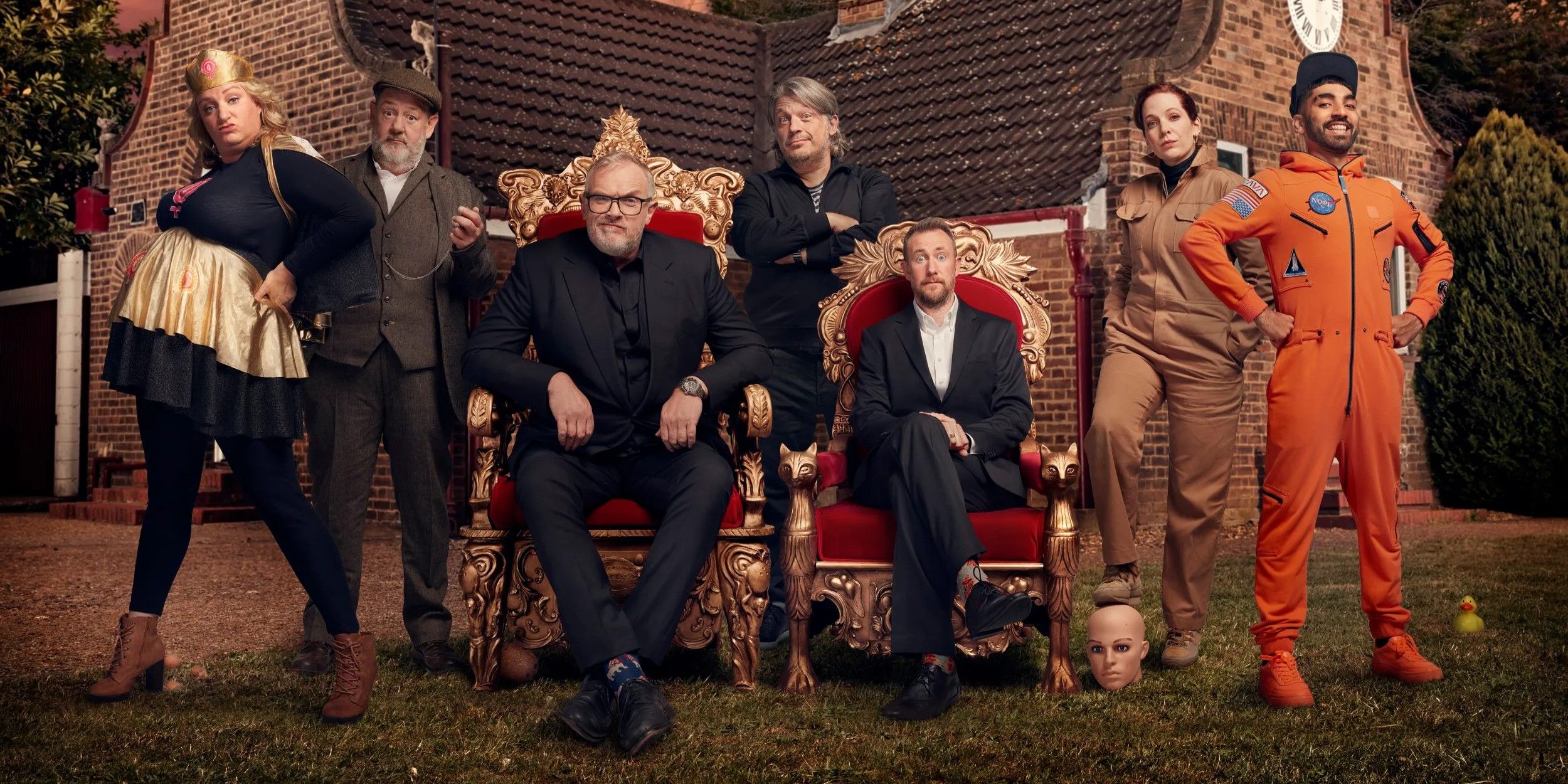 Promo image from Taskmaster season 10 of Daisy May Cooper, Johnny Vegas, Katherine Parkinson, Mawaan Rizwan and Richard Herring with hosts Greg Davies and Alex Horne