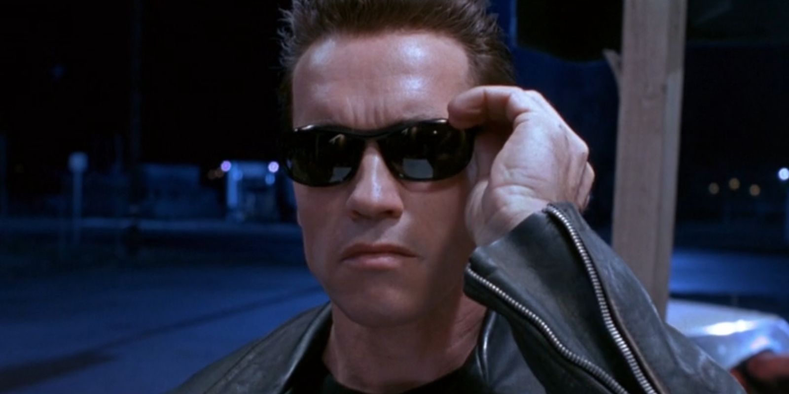 The Terminator, played by Arnold Schwarzenegger, puts on his sunglasses in 'Terminator 2: Judgment Day'.