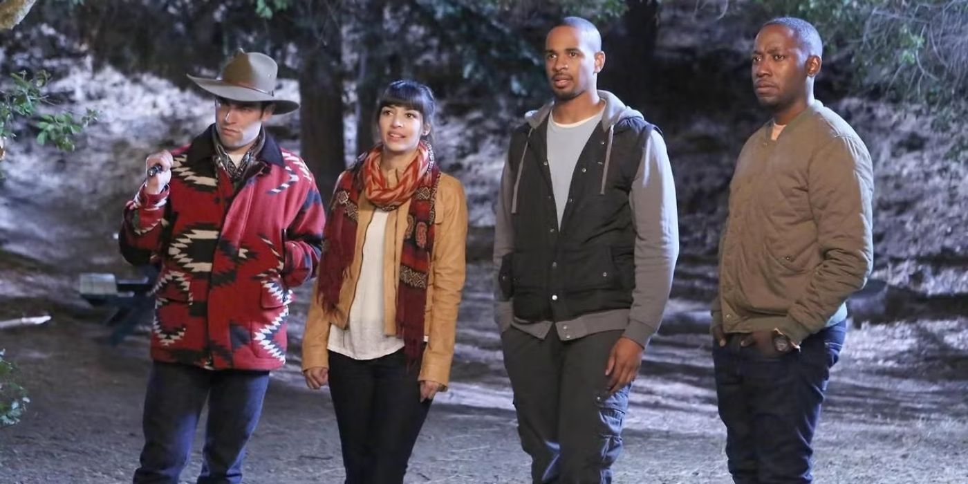 Schmidt, Cece, Coach, and Winston look unhappy standing in the woods at night in New Girl.
