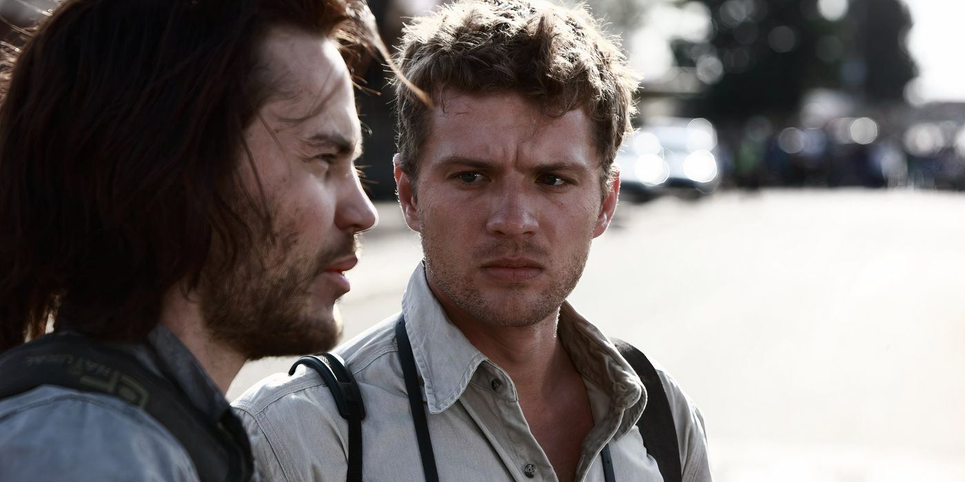 Two men looking at each other in The Bang Bang Club