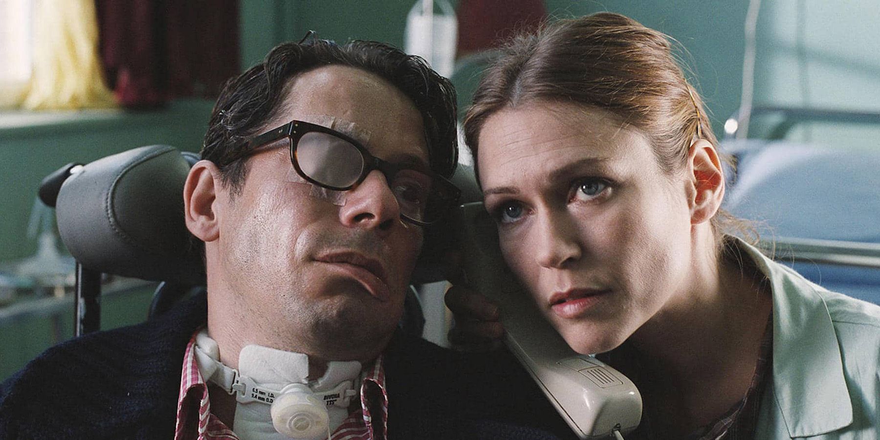 Mathieu Amalric and Marie-Josee Croze talk on a phone in The Diving Bell and the Butterfly