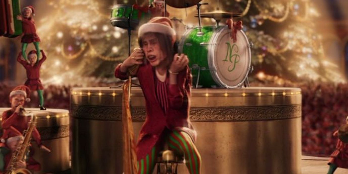 The elf singer (Steven Tyler) on a unicycle singing in 'The Polar Express'