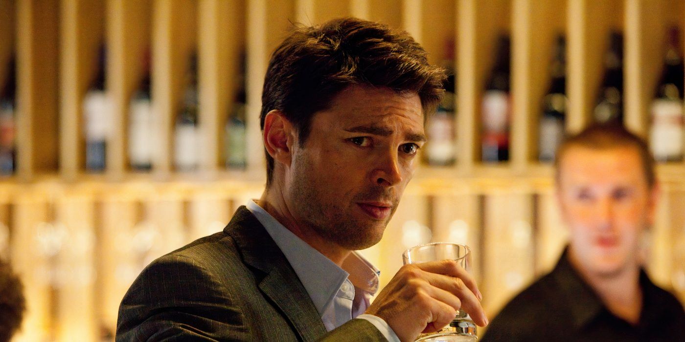 Karl Urban at a bar in 'The Loft' (2014)