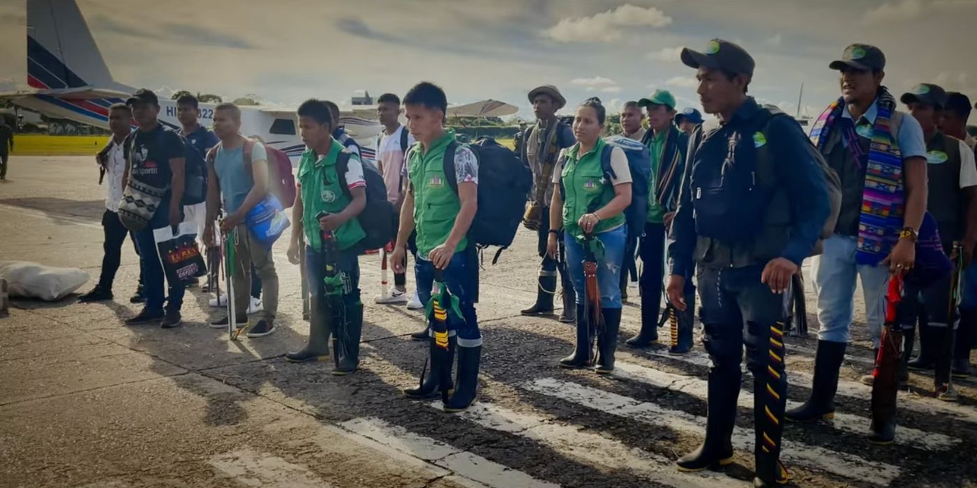 Volunteers from Operation Hope standing in front of a plane