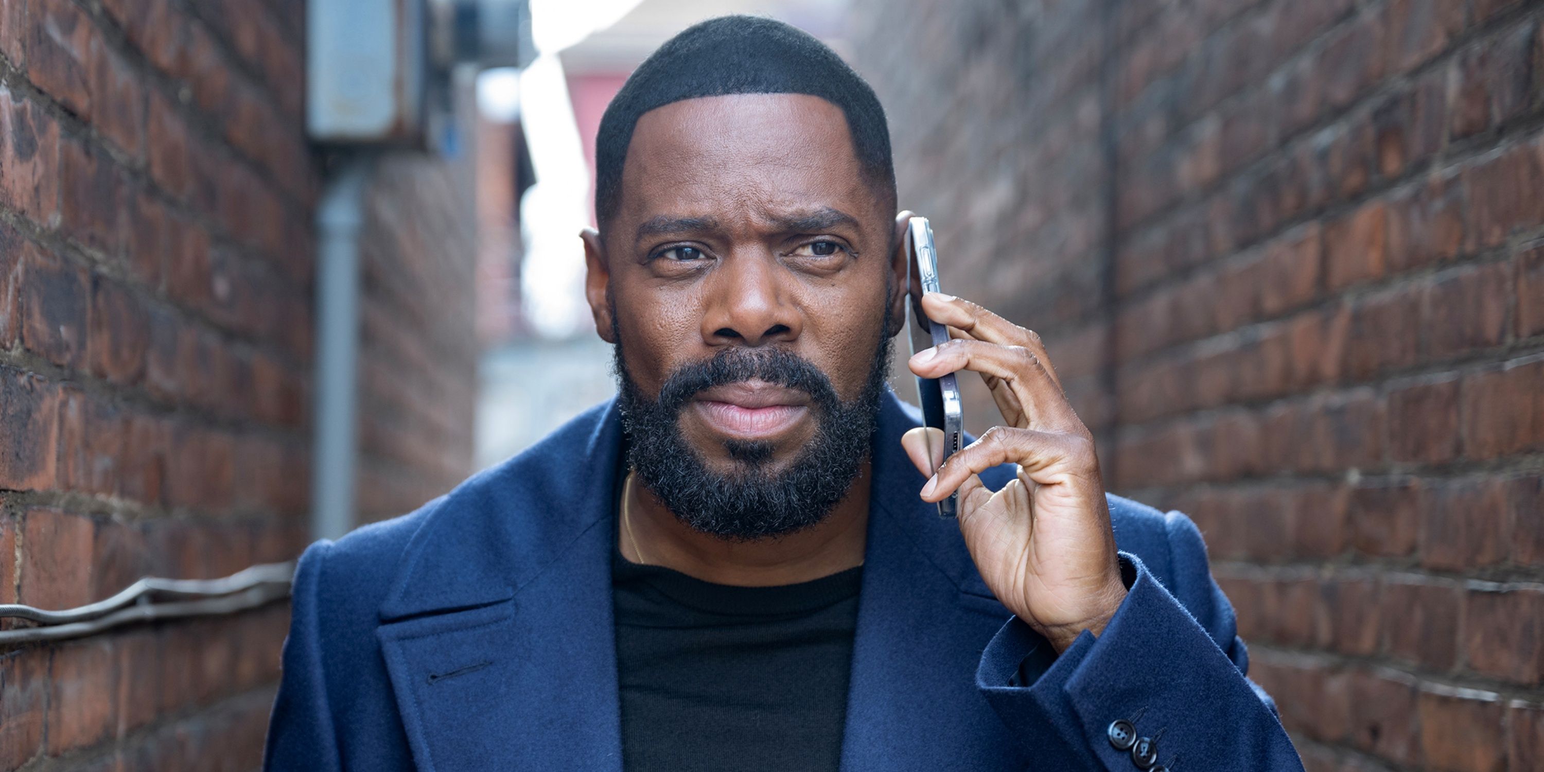 Colman Domingo as Muncie Daniels walking outside while on his cell phone in The Madness