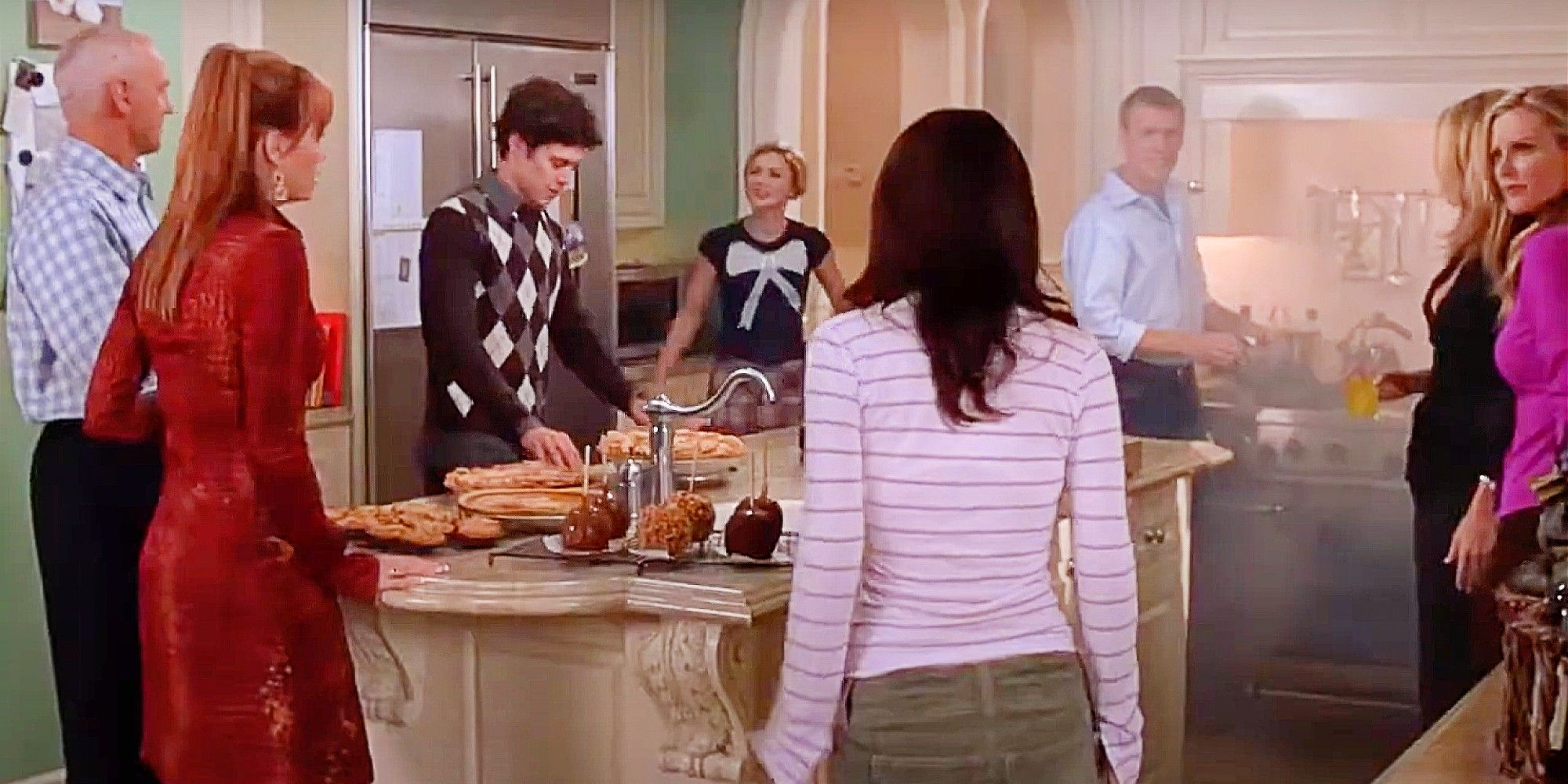 Caleb, Julie, Seth, Anna, Summer, Jimmy, and Kirsten at Thanksgiving in the Cohen&rsquo;s household in The O.C.