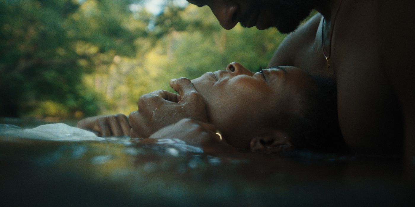 Close-up of Berniece (Danielle Deadwyler) being held in a river