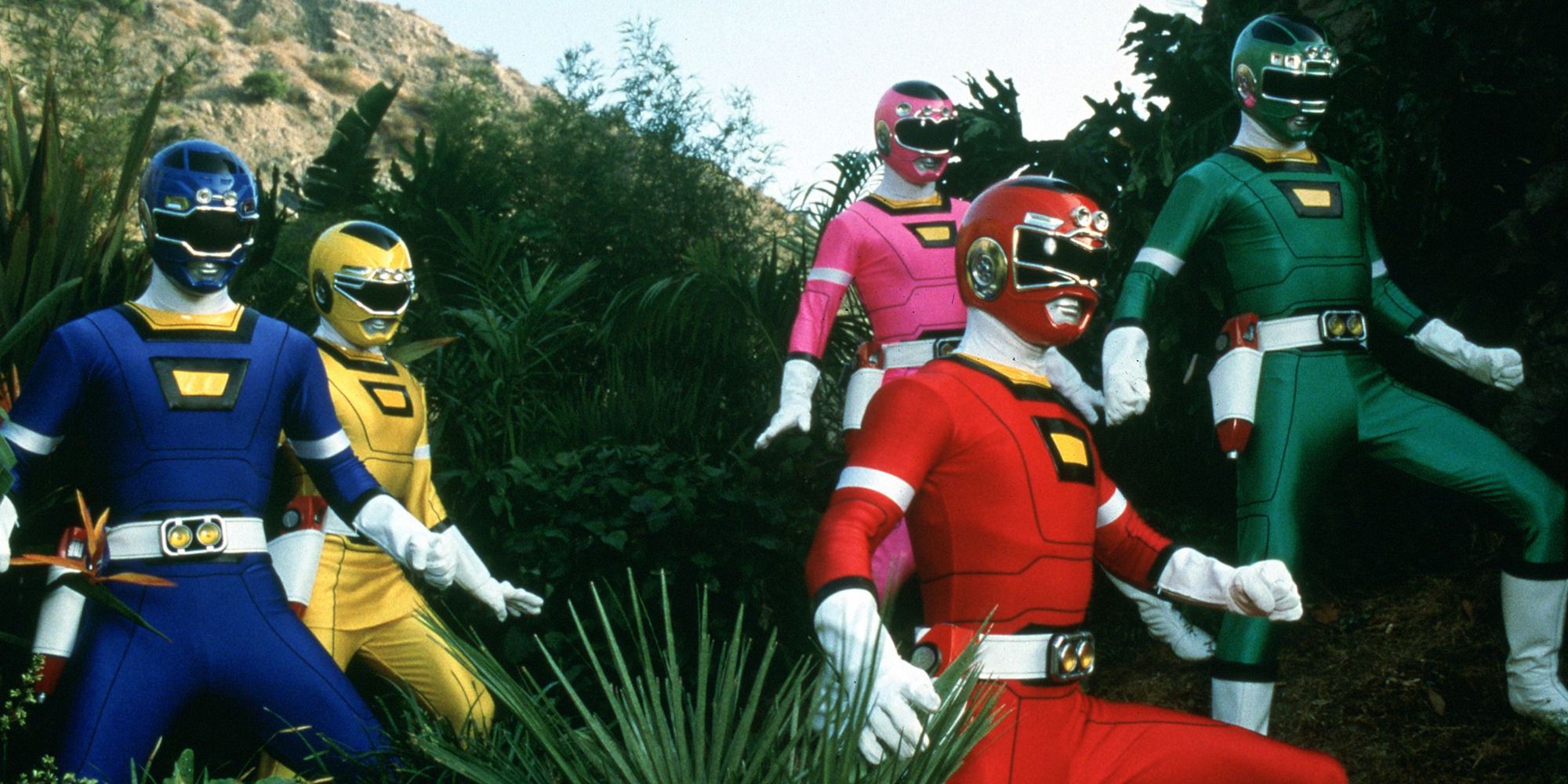 The Power Rangers out in a field in 'Turbo: A Power Rangers Movie'