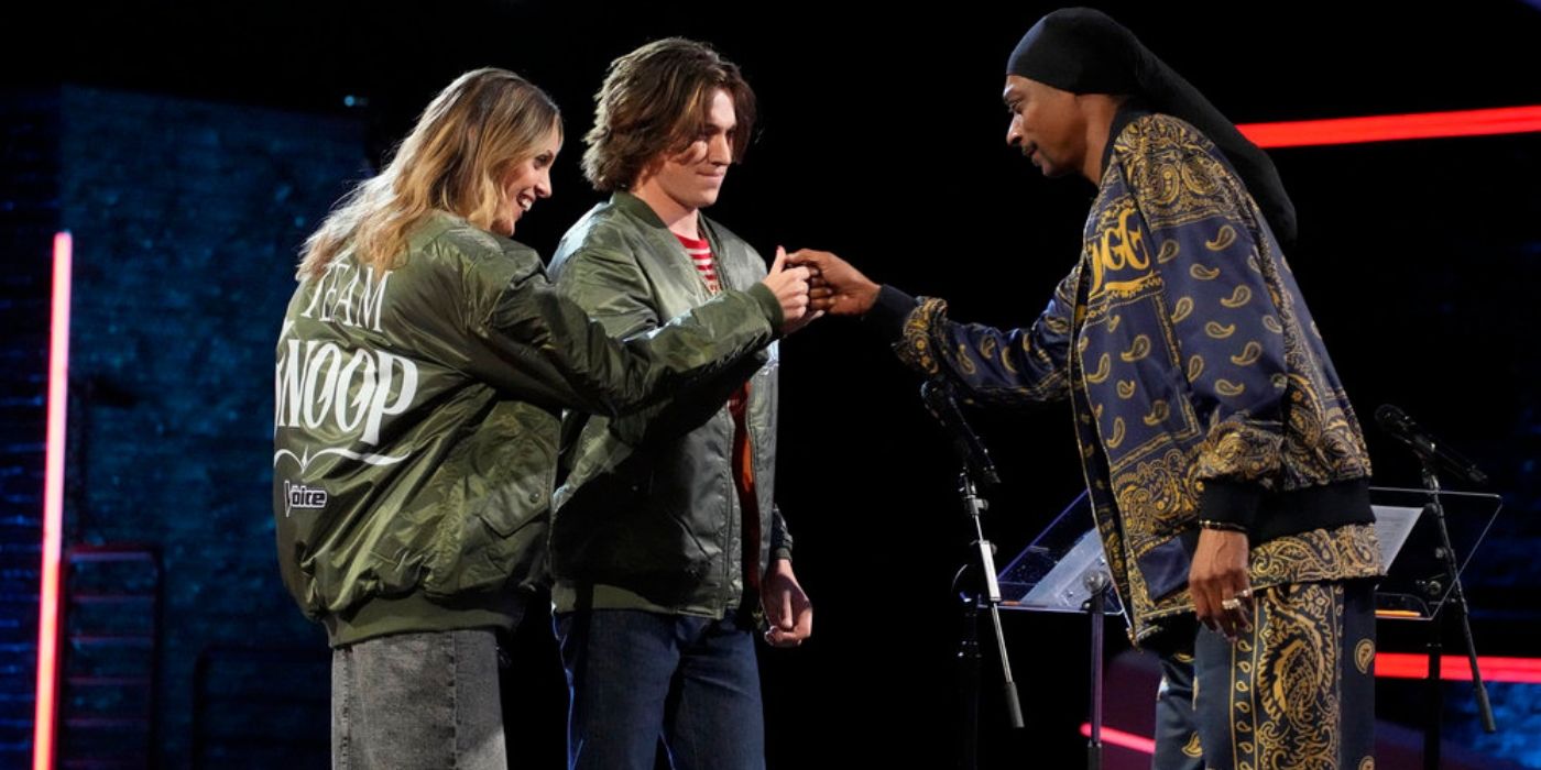 Mary McAvoy and Michael Alexandersson get their jackets from their Coach Snoop Dogg on 'The Voice' Season 26.