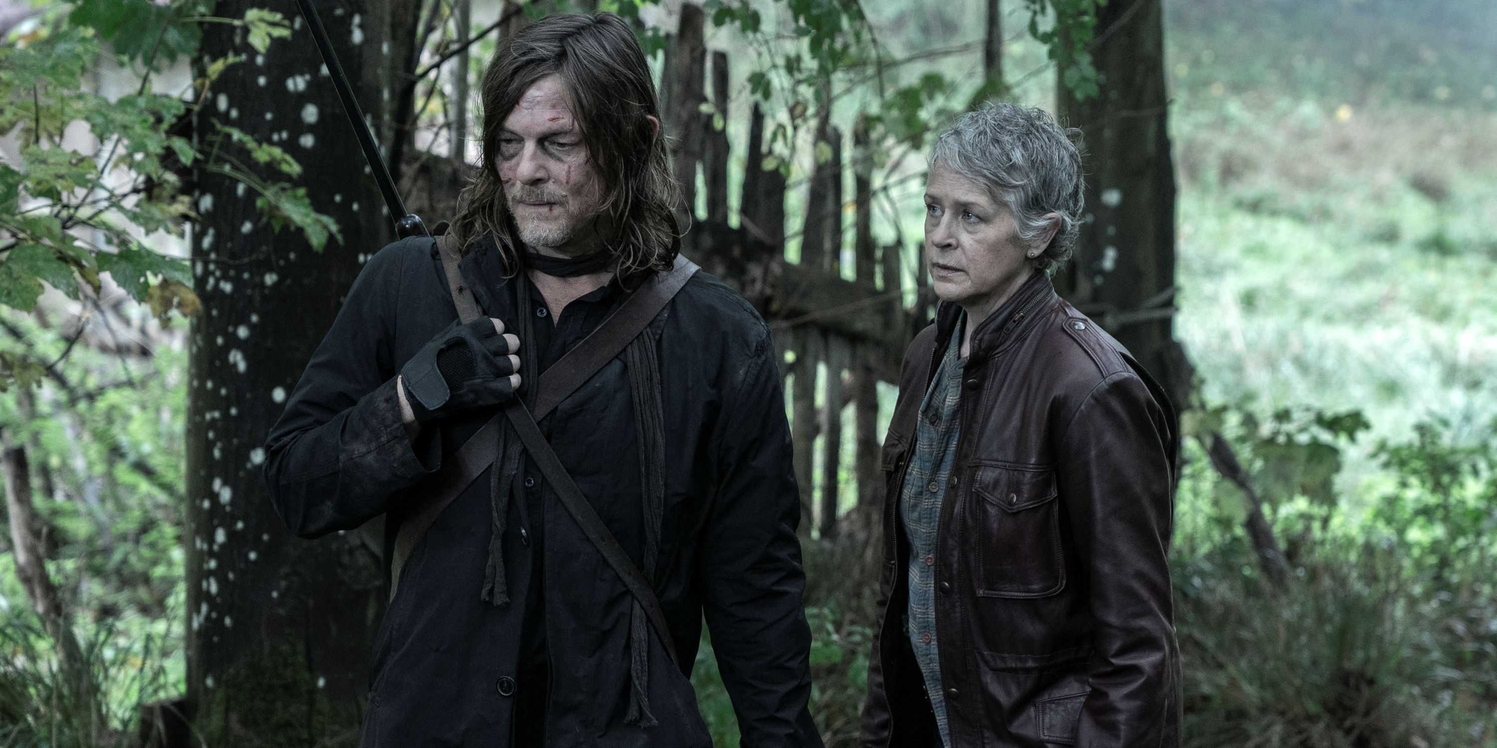 Norman Reedus as Daryl standing outside next to Melissa McBride in The Walking Dead: Daryl Dixon Season 2