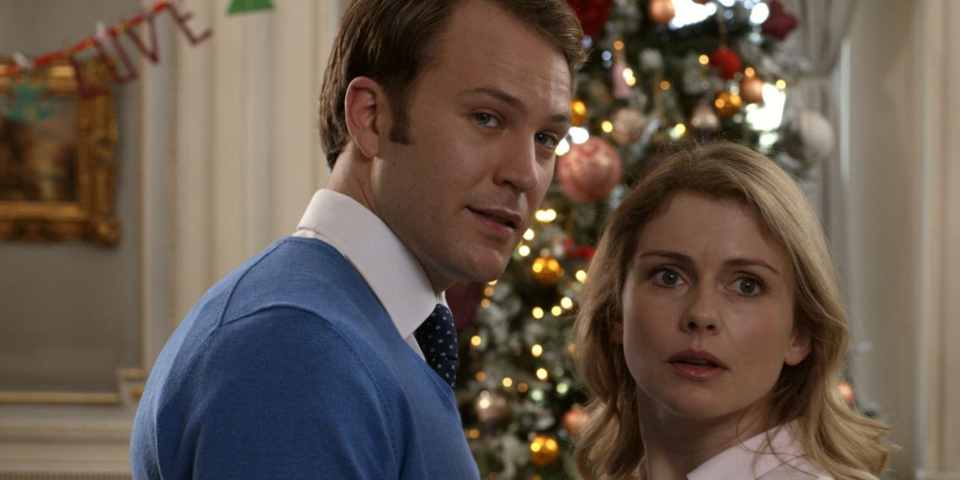 Richard and Amber look shocked at the camera in The Christmas Prince