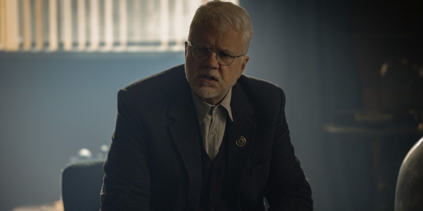 Tim Robbins, looking perplexed, as Bernard Holland in Silo Season 2 Episode 1