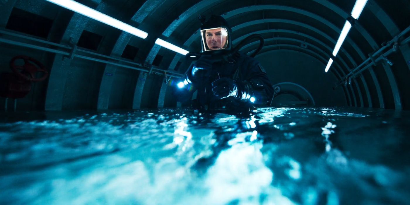 Tom Cruise as Ethan Hunt in a scuba suit in a flooded submarine in Mission: Impossible - The Final Reckoning.