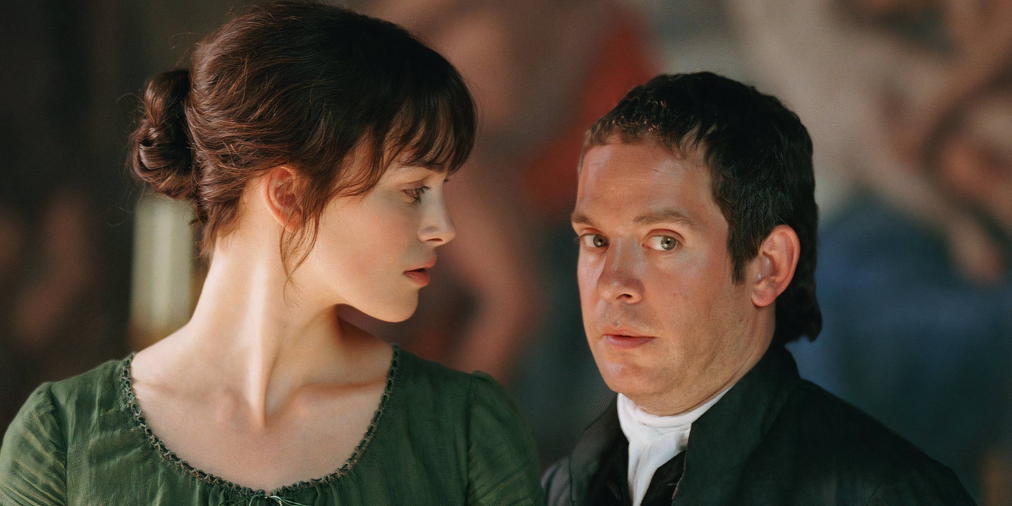 Tom Hollander as Mr. Collins and Keira Knightley as Elizabeth Swann in Pride &amp; Prejudice