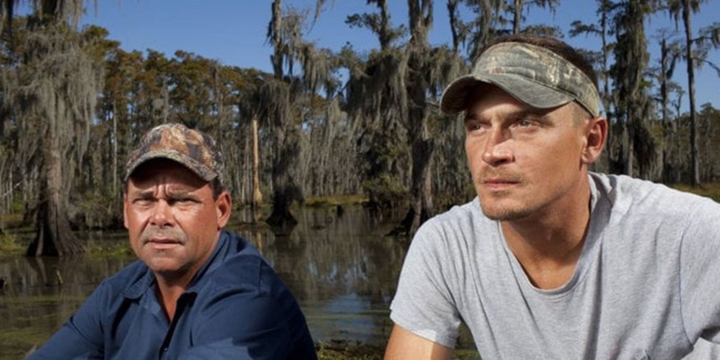 Tommy Chauvin and Joe LaFont from &lsquo;Swamp People&rsquo; sit next to each other outside.
