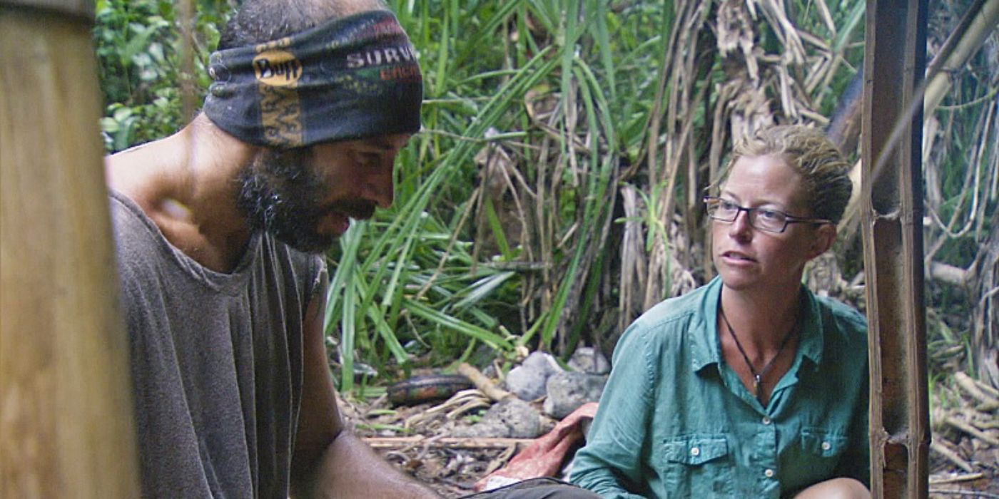 Tony Vlachos and Kass McQuillen sit near each other with the jungle in the background on Survivor.