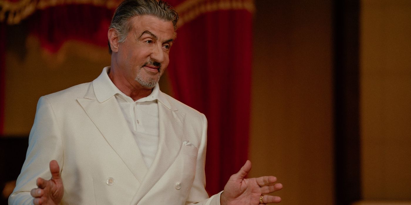 Sylvester Stallone wearing a white suit