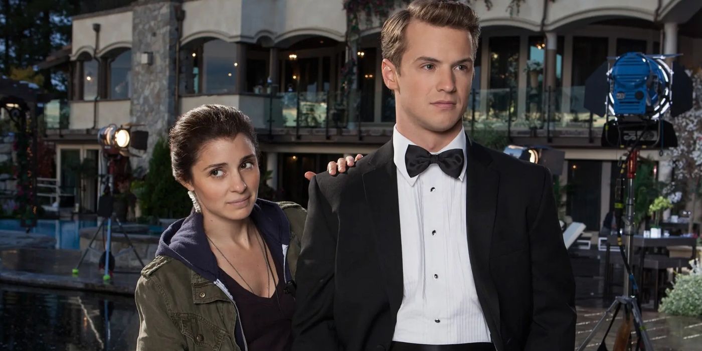 Rachel stands next to Adam who is wearing a tuxedo in a scene from UnREAL.