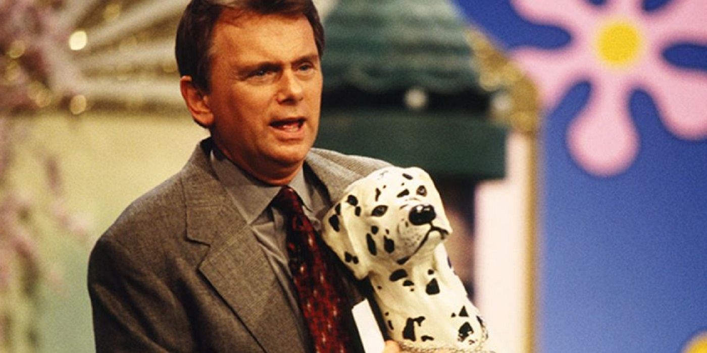 Pat Sajak holding a Ceramic Dalmatian Statue on 'Wheel of Fortune'