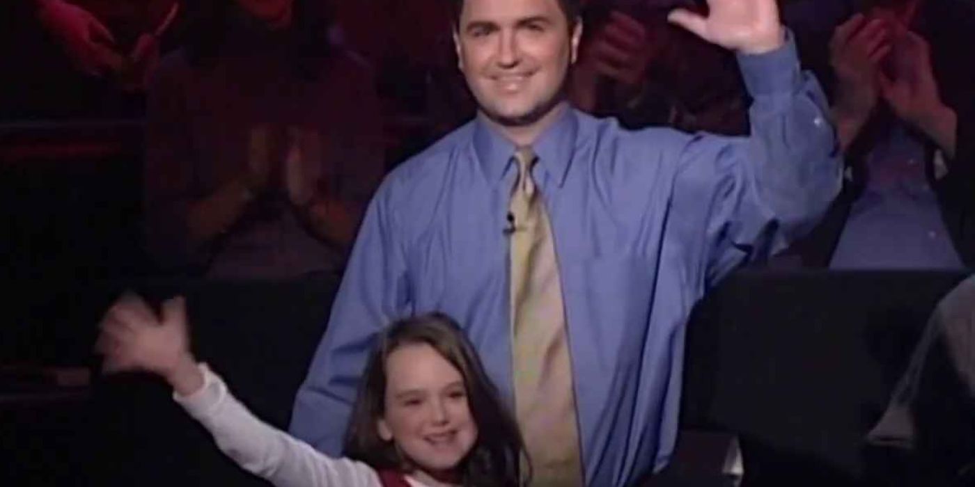 Contestants Peter and Abby Abide wave on Who Wants to Be a Millionaire Thanksgiving Special. 