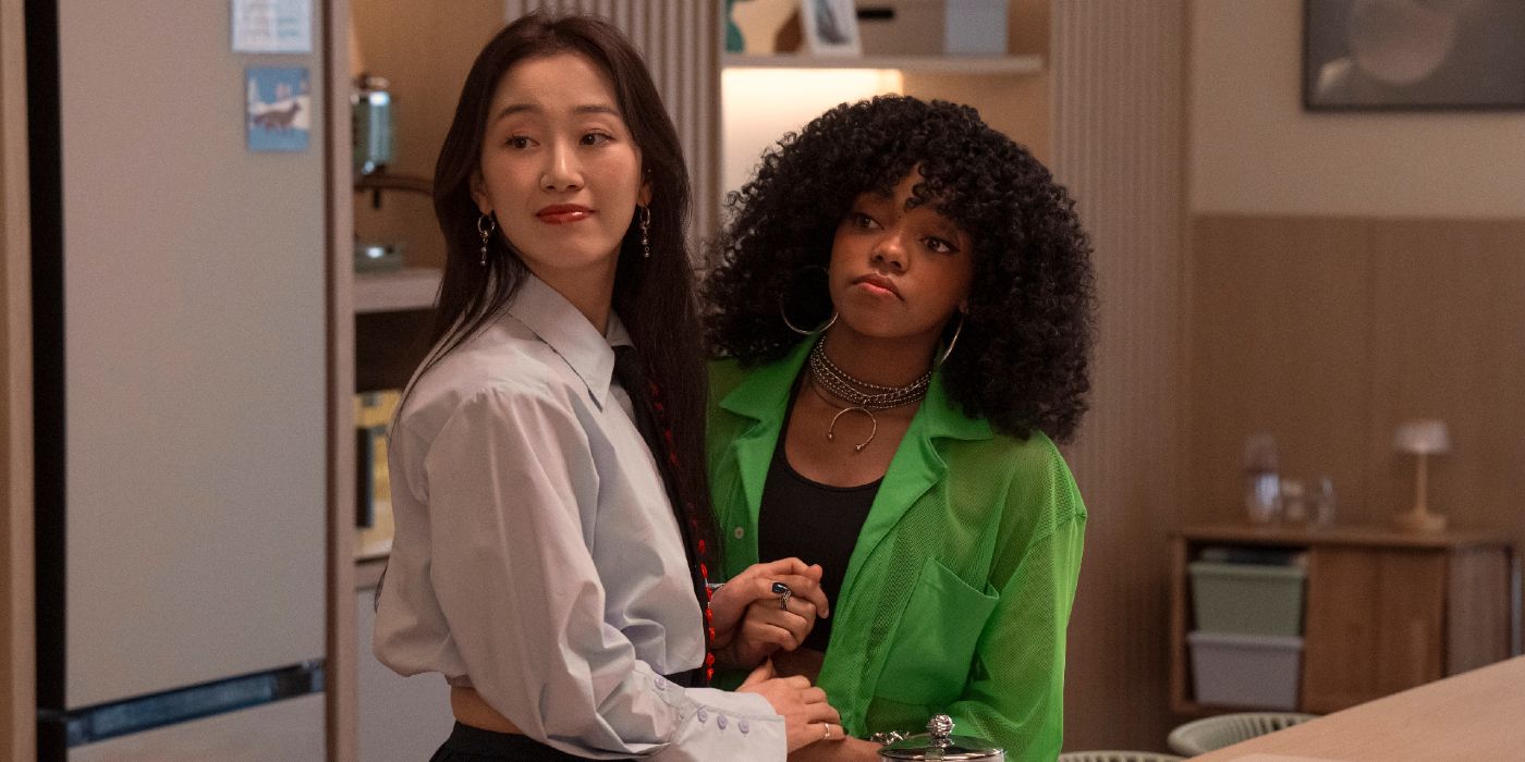 Gia Kim turns away while prepping tea with Regan Aliyah in XO, Kitty Season 2