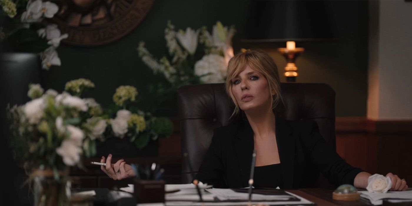 Beth Dutton (Kelly Reilly) smokes in her brother's office on Yellowstone