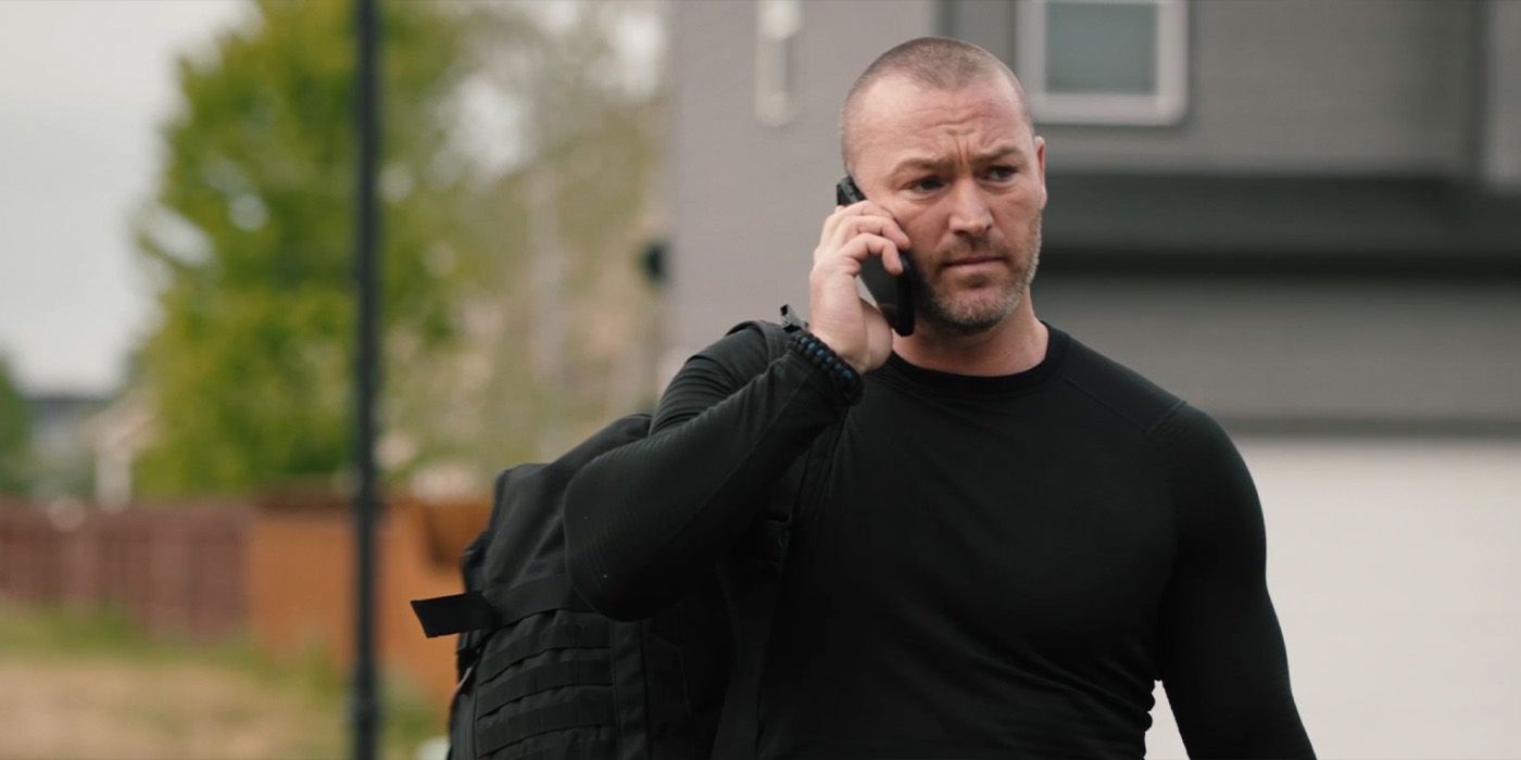 Jake McLaughlin plays Cade McPherson on the phone in Yellowstone